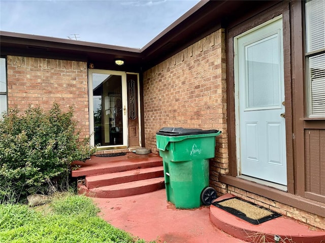 311 Parker St, Waurika, OK 73573 - view of exterior entry with brick siding