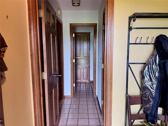 311 Parker St, Waurika, OK 73573 - hallway featuring light tile patterned flooring