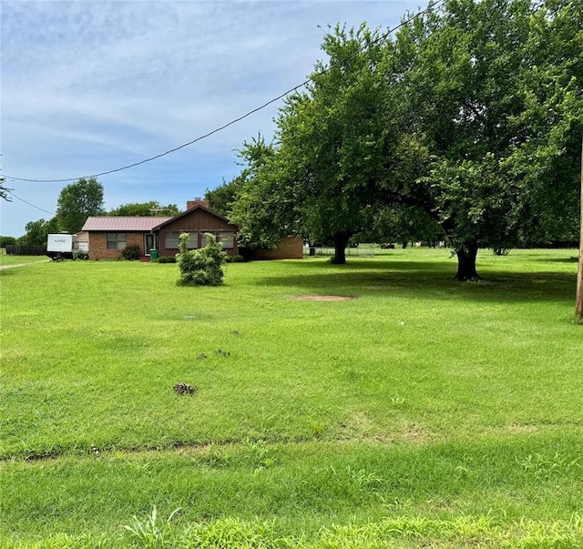 311 Parker St, Waurika, OK 73573 - view of grassy yard