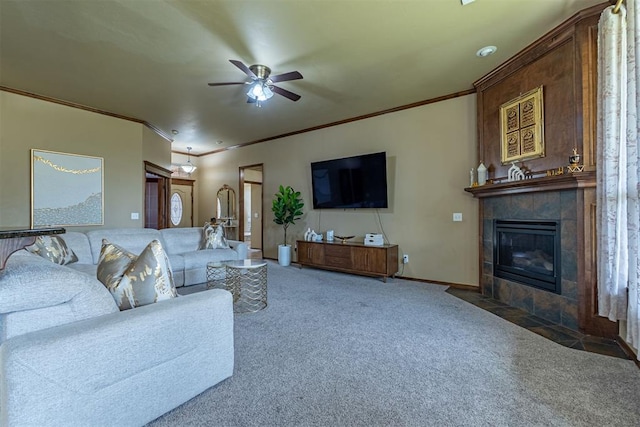 716 SW 157th St, Oklahoma City, OK 73170 - carpeted living area with crown molding, ceiling fan, and a tiled fireplace
