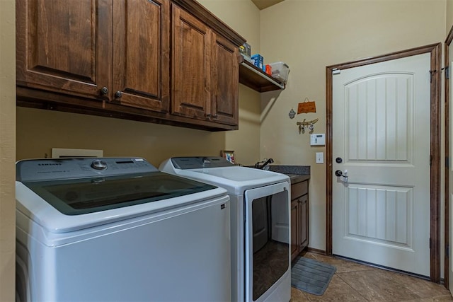 716 SW 157th St, Oklahoma City, OK 73170 - laundry room featuring washing machine and clothes dryer and cabinet space