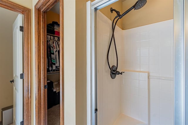 716 SW 157th St, Oklahoma City, OK 73170 - full bathroom featuring a stall shower and a spacious closet