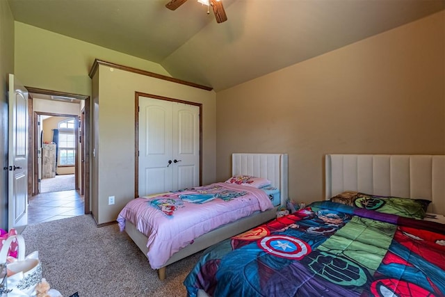 716 SW 157th St, Oklahoma City, OK 73170 - bedroom with lofted ceiling, light colored carpet, a ceiling fan, and a closet