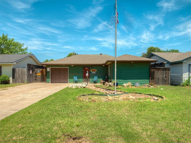 1209 Dakota St, Norman, OK 73069 - ranch-style house with concrete driveway and an attached garage