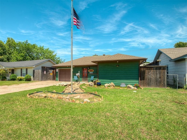 1209 Dakota St, Norman, OK 73069 - view of front of property featuring concrete driveway and a garage