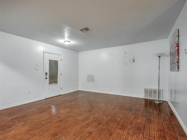 1209 Dakota St, Norman, OK 73069 - unfurnished room with wood-type flooring and baseboards