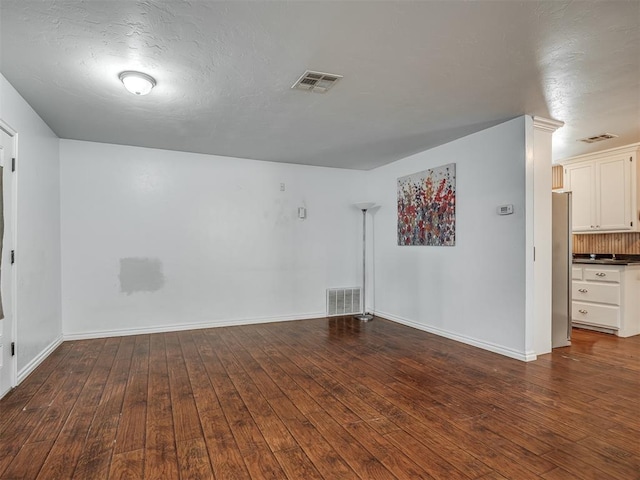 1209 Dakota St, Norman, OK 73069 - empty room featuring hardwood / wood-style flooring and baseboards