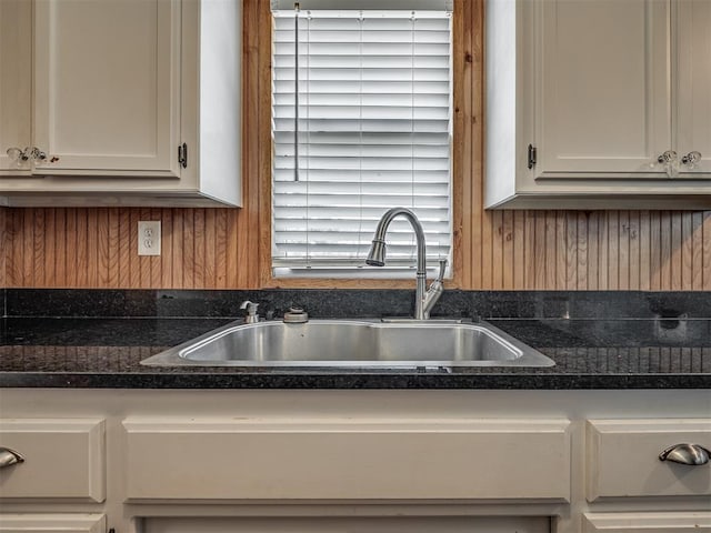 1209 Dakota St, Norman, OK 73069 - kitchen featuring white cabinets and dark countertops