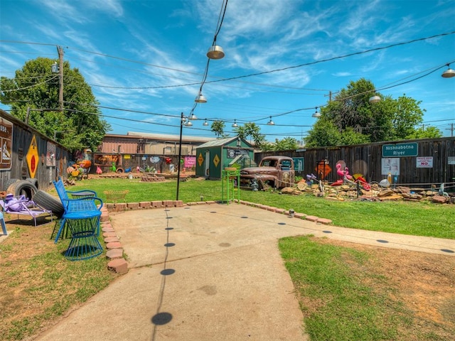 1209 Dakota St, Norman, OK 73069 - fenced backyard with a patio