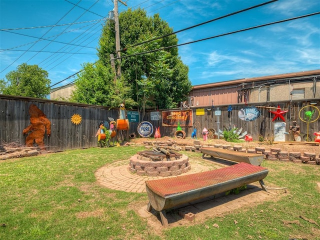 1209 Dakota St, Norman, OK 73069 - view of yard with an outdoor fire pit