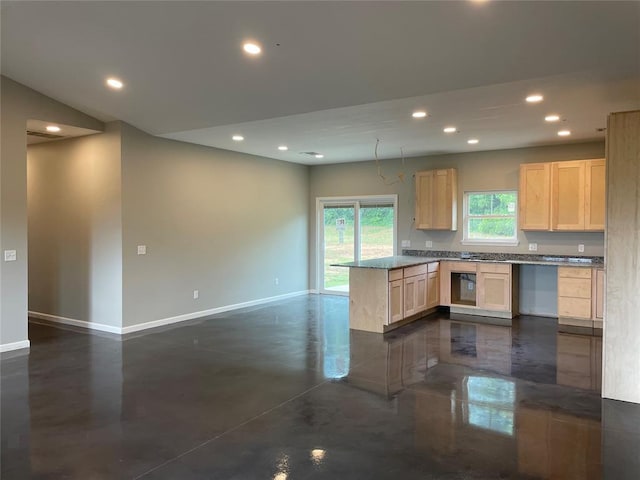 17008 County St Unit 2750, Minco, OK 73059 - kitchen with recessed lighting, light brown cabinets, a peninsula, finished concrete flooring, and open floor plan