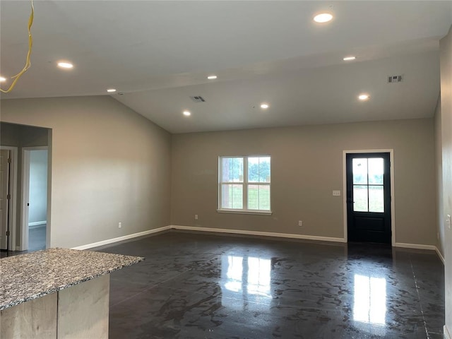17008 County St Unit 2750, Minco, OK 73059 - unfurnished living room with plenty of natural light, recessed lighting, and lofted ceiling