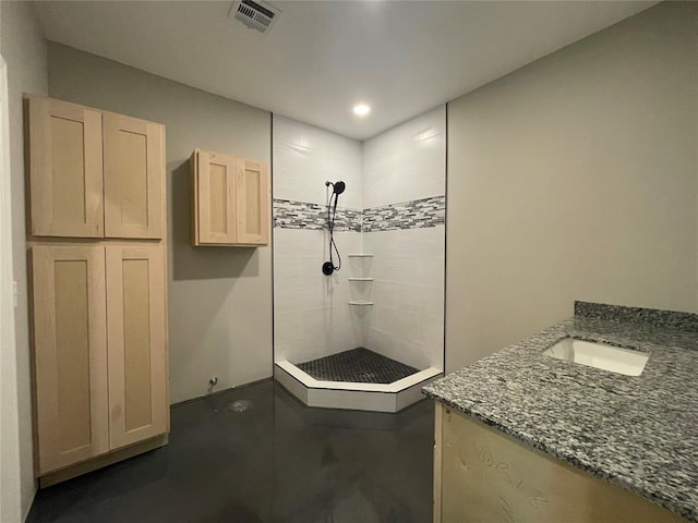 17008 County St Unit 2750, Minco, OK 73059 - bathroom featuring tiled shower, vanity, recessed lighting, and finished concrete floors
