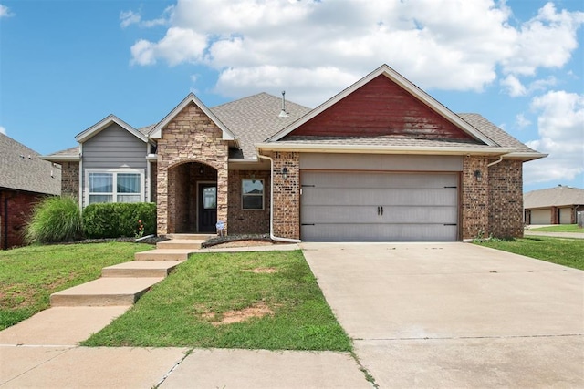 8401 NW 140th St, Oklahoma City, OK 73142 - view of front of home with an attached garage, a front yard, driveway, and brick siding
