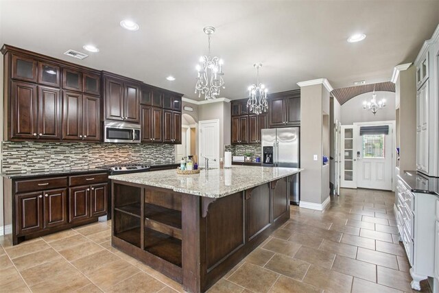 8401 NW 140th St, Oklahoma City, OK 73142 - kitchen with appliances with stainless steel finishes, a chandelier, dark brown cabinets, open shelves, and backsplash