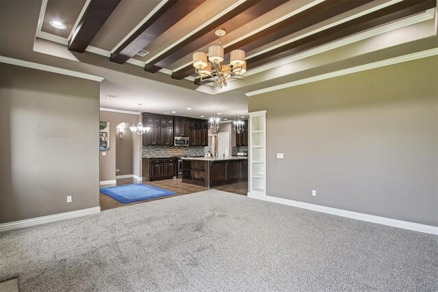8401 NW 140th St, Oklahoma City, OK 73142 - unfurnished living room with a chandelier, dark colored carpet, crown molding, and recessed lighting