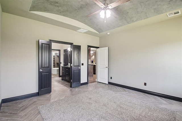 8401 NW 140th St, Oklahoma City, OK 73142 - unfurnished bedroom featuring vaulted ceiling and ceiling fan