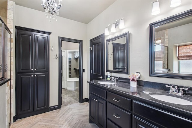 8401 NW 140th St, Oklahoma City, OK 73142 - full bathroom with double vanity, a closet, a tile shower, and a chandelier