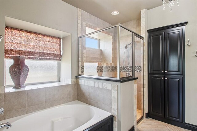 8401 NW 140th St, Oklahoma City, OK 73142 - full bath featuring plenty of natural light, a bath, a stall shower, and recessed lighting