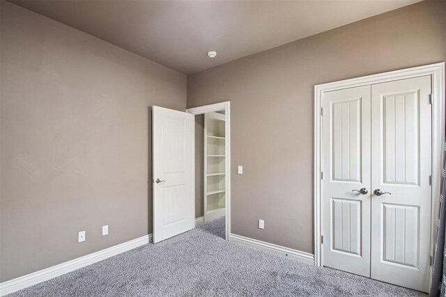 8401 NW 140th St, Oklahoma City, OK 73142 - unfurnished bedroom with carpet and a closet