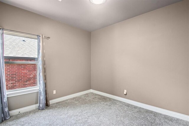 8401 NW 140th St, Oklahoma City, OK 73142 - carpeted empty room with baseboards