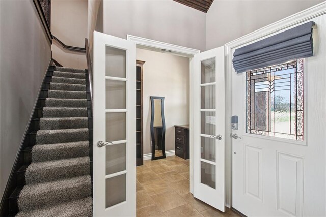 8401 NW 140th St, Oklahoma City, OK 73142 - foyer entrance with french doors and stairway