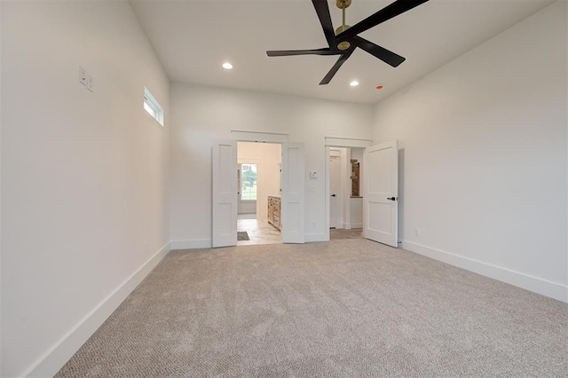 1801 Cedar Valley Mnr, Guthrie, OK 73044 - unfurnished bedroom with light carpet, recessed lighting, multiple windows, and a ceiling fan