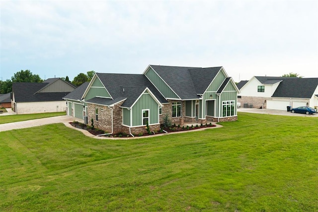1801 Cedar Valley Mnr, Guthrie, OK 73044 - craftsman inspired home with board and batten siding, driveway, an attached garage, and a front yard
