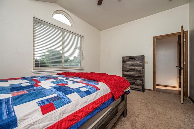 912 S Boynton Ave, El Reno, OK 73036 - bedroom featuring multiple windows, light carpet, vaulted ceiling, and a ceiling fan