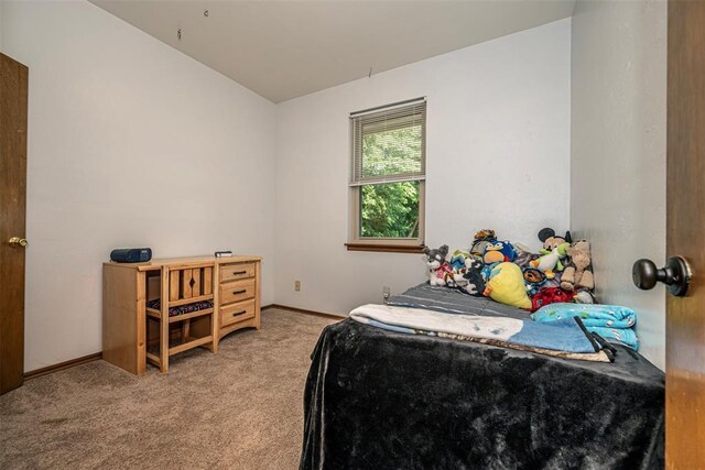 912 S Boynton Ave, El Reno, OK 73036 - bedroom with light colored carpet and lofted ceiling