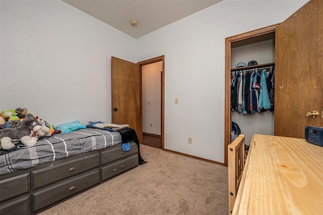 912 S Boynton Ave, El Reno, OK 73036 - carpeted bedroom featuring a closet and a walk in closet