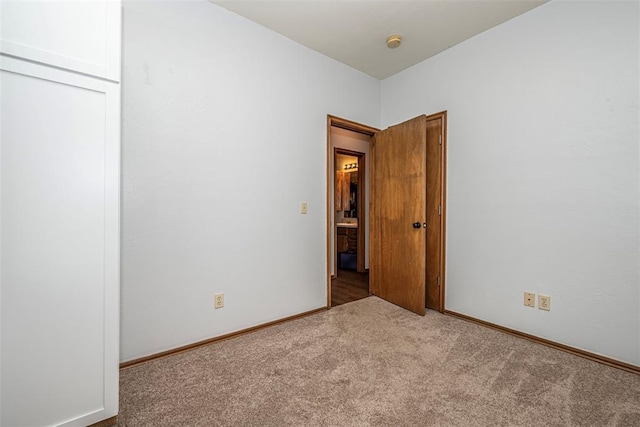 912 S Boynton Ave, El Reno, OK 73036 - unfurnished bedroom with carpet and a closet