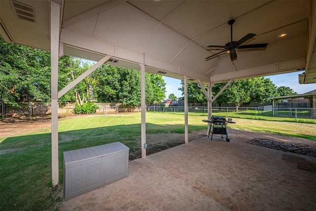 912 S Boynton Ave, El Reno, OK 73036 - fenced backyard with ceiling fan, a patio, and grilling area