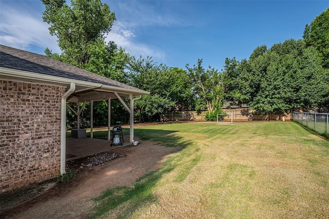 912 S Boynton Ave, El Reno, OK 73036 - fenced backyard with a gazebo and a patio area