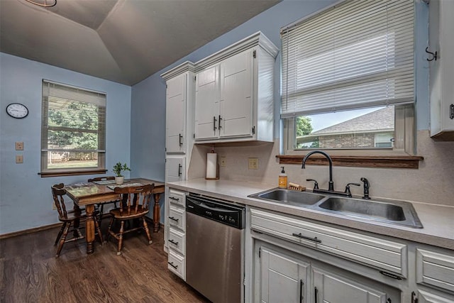 912 S Boynton Ave, El Reno, OK 73036 - kitchen with dishwasher, dark wood-type flooring, lofted ceiling, light countertops, and white cabinets
