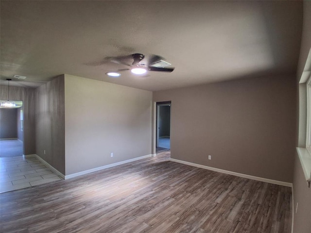 814 E Midland St, Shawnee, OK 74804 - unfurnished room with a ceiling fan and wood finished floors