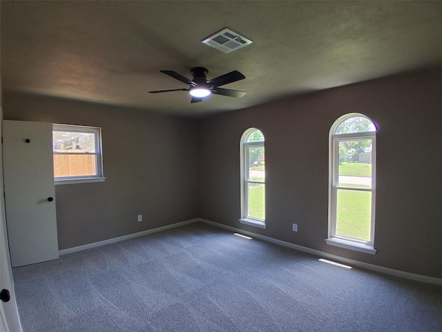 814 E Midland St, Shawnee, OK 74804 - empty room featuring carpet flooring and a ceiling fan