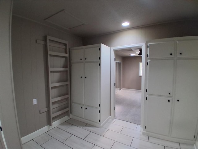 814 E Midland St, Shawnee, OK 74804 - unfurnished bedroom featuring recessed lighting, light tile patterned floors, attic access, and a closet
