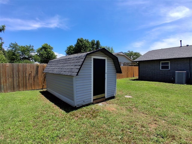 814 E Midland St, Shawnee, OK 74804 - view of shed featuring a fenced backyard