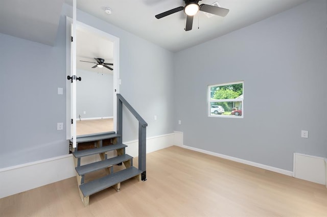 239 SE 48th St, Oklahoma City, OK 73129 - staircase featuring wood finished floors and ceiling fan