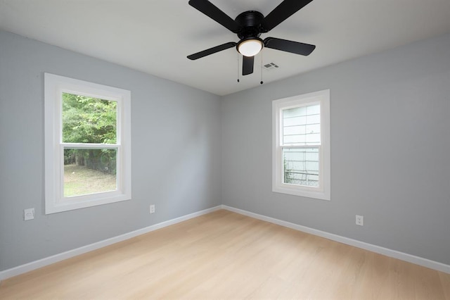 239 SE 48th St, Oklahoma City, OK 73129 - empty room featuring light wood finished floors and a ceiling fan