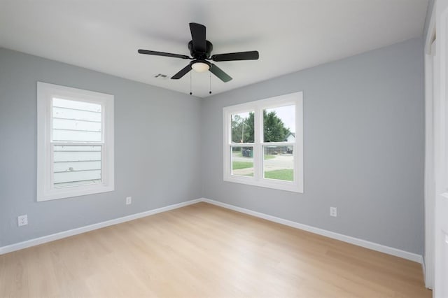 239 SE 48th St, Oklahoma City, OK 73129 - unfurnished room featuring light wood-style flooring and ceiling fan