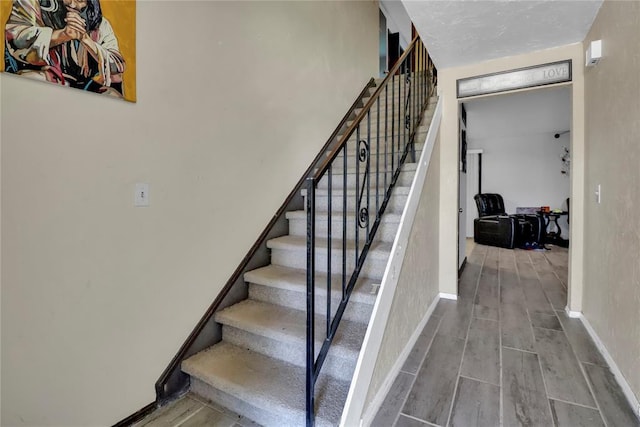 4904 Washington St, Oklahoma City, OK 73135 - stairs featuring wood finished floors