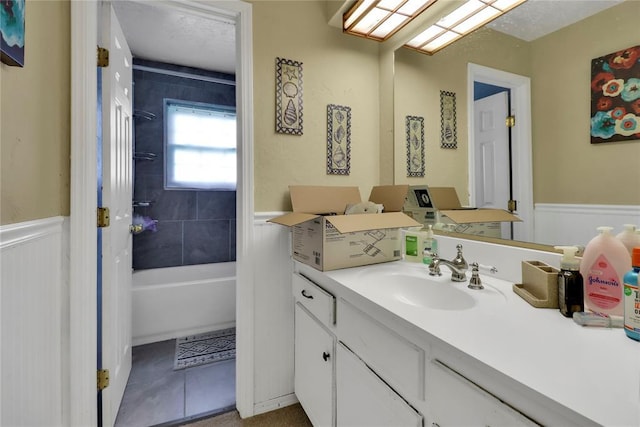 4904 Washington St, Oklahoma City, OK 73135 - full bathroom with wainscoting and vanity