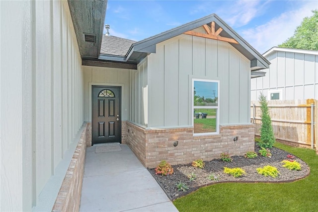 316 SE 45th St, Oklahoma City, OK 73129 - property entrance featuring board and batten siding and brick siding
