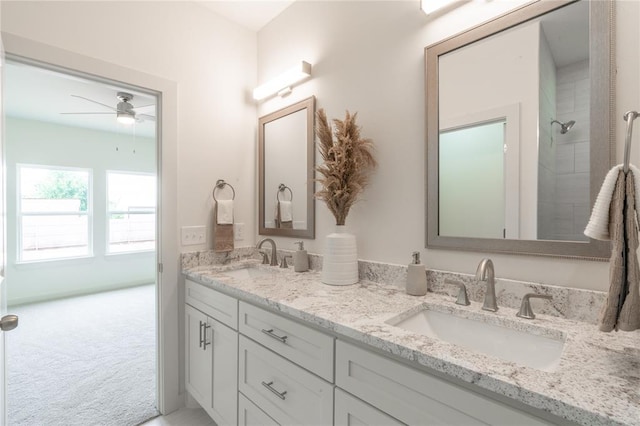 316 SE 45th St, Oklahoma City, OK 73129 - full bathroom with double vanity and a ceiling fan