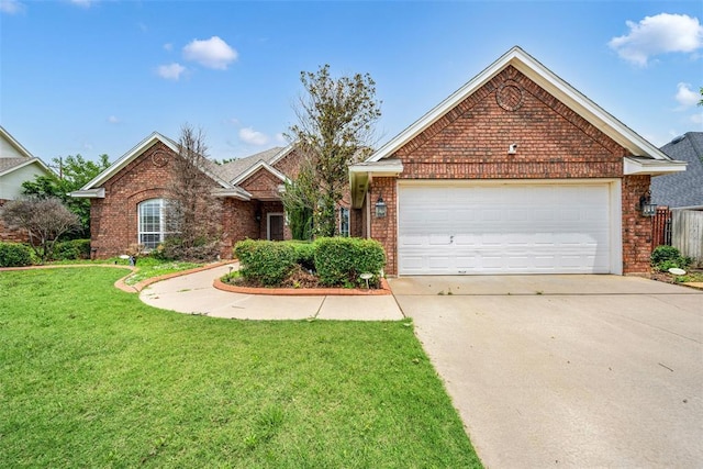 817 NW 76th St, Lawton, OK 73505 - view of front of property with brick siding, driveway, a front yard, and a garage