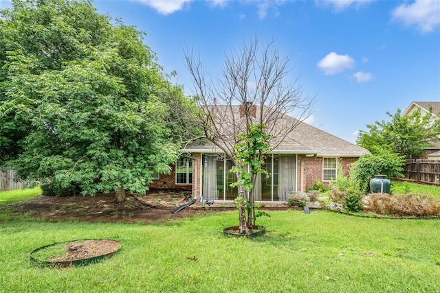 817 NW 76th St, Lawton, OK 73505 - view of front of property featuring brick siding and a chimney