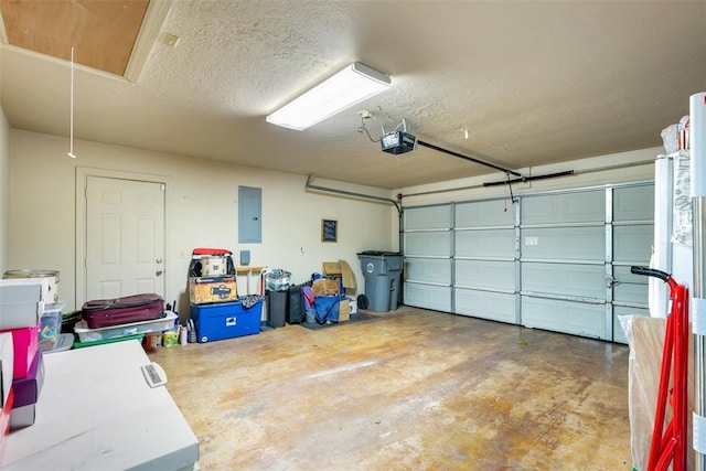 817 NW 76th St, Lawton, OK 73505 - garage featuring a garage door opener and electric panel