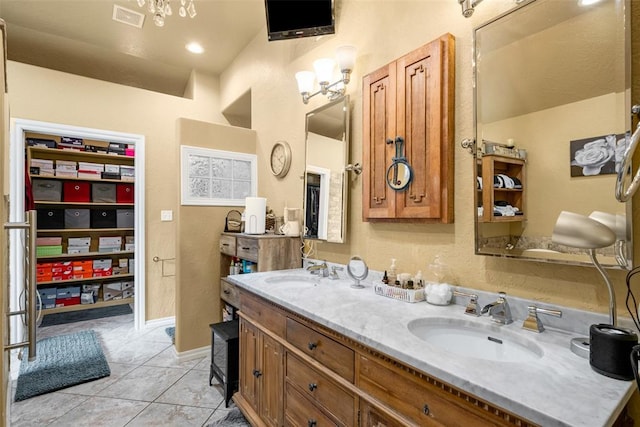 817 NW 76th St, Lawton, OK 73505 - full bathroom with tile patterned floors and double vanity